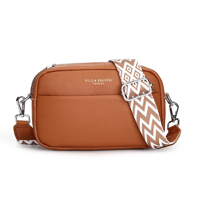 Trendy Crossbody Tas met Grafische Schouderband