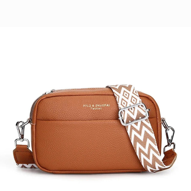 Trendy Crossbody Tas met Grafische Schouderband